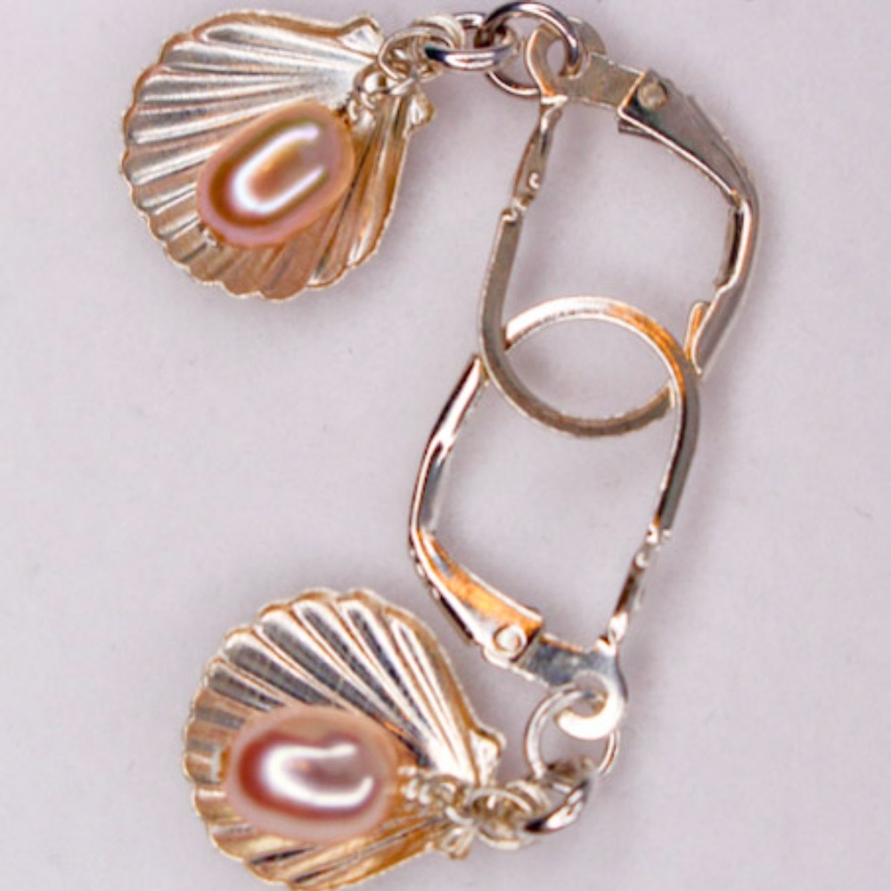 Pearl on a shell earrings